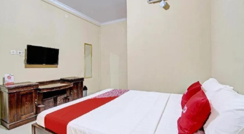 Bed in OYO 91353 Hotel Surya Andesa