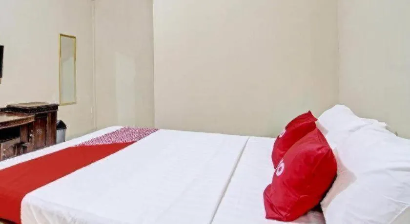 Bed in OYO 91353 Hotel Surya Andesa