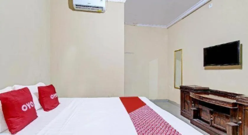 Bed in OYO 91353 Hotel Surya Andesa