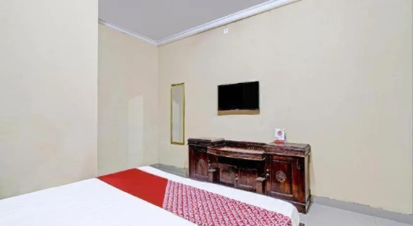 Bed in OYO 91353 Hotel Surya Andesa
