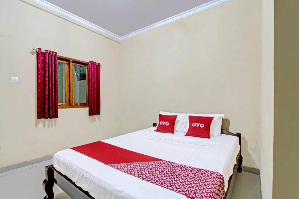 Bed in OYO 91353 Hotel Surya Andesa