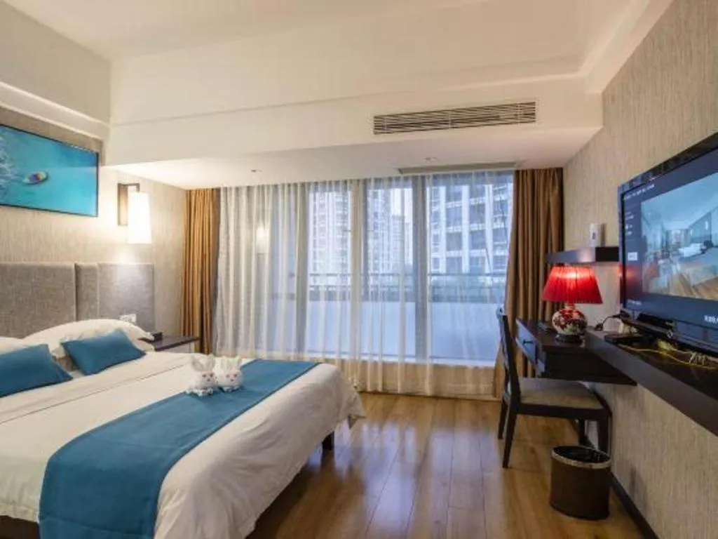 Bed in Ramada Encore by Wyndham Qionghai Downtown