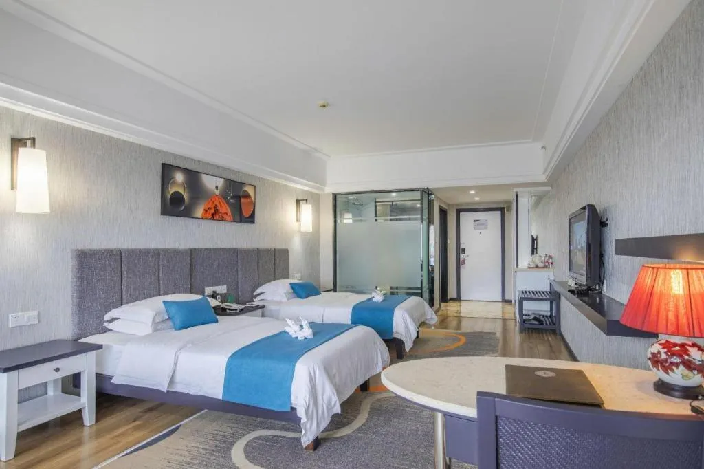 Bed in Ramada Encore by Wyndham Qionghai Downtown