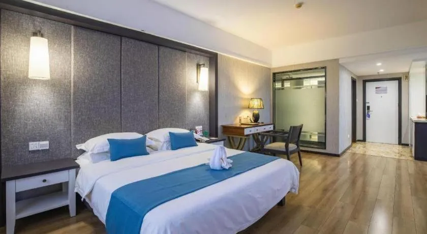 Bed in Ramada Encore by Wyndham Qionghai Downtown