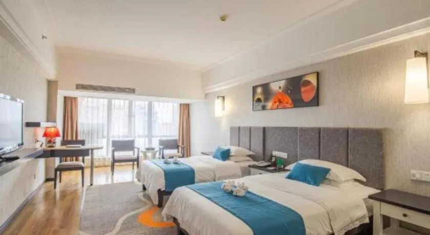 Bed in Ramada Encore by Wyndham Qionghai Downtown