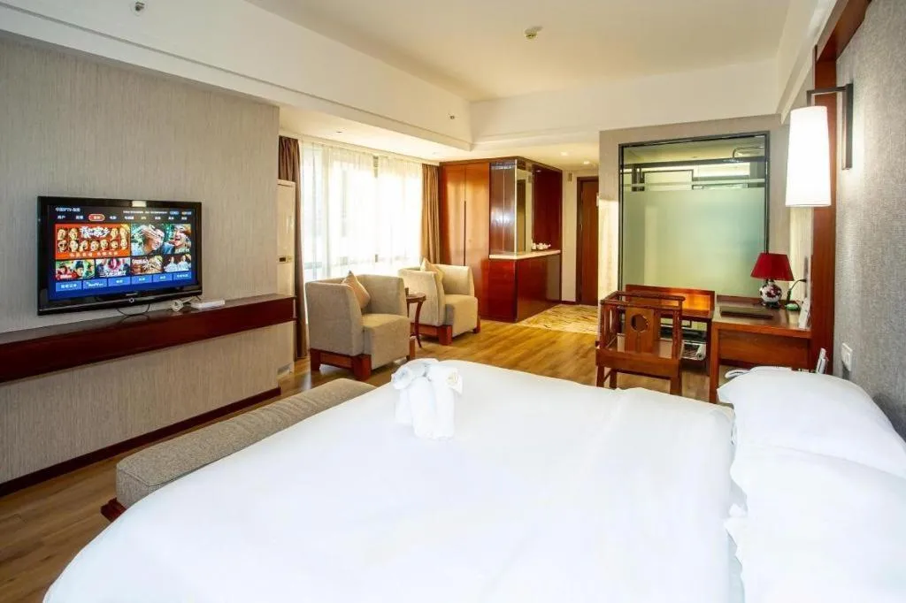 Bed in Ramada Encore by Wyndham Qionghai Downtown