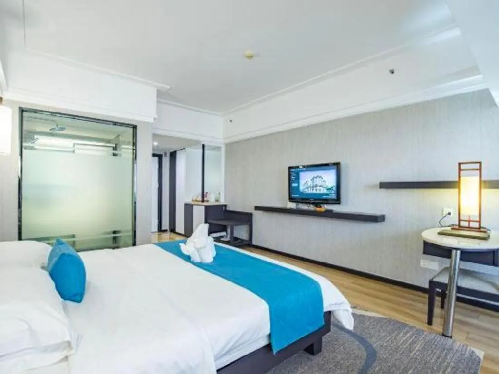 Bed in Ramada Encore by Wyndham Qionghai Downtown