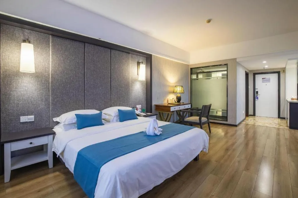 Bed in Ramada Encore by Wyndham Qionghai Downtown