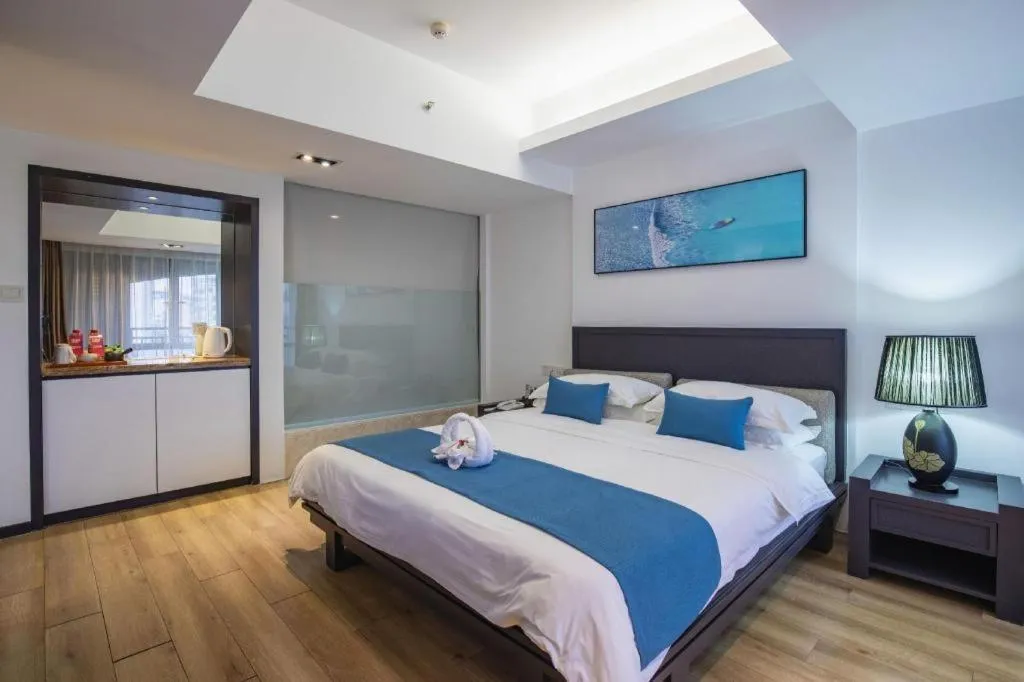 Bed in Ramada Encore by Wyndham Qionghai Downtown