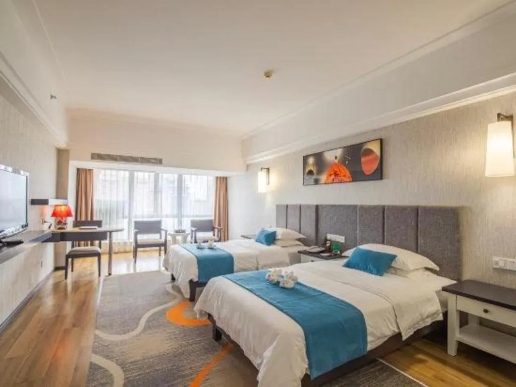 Bed in Ramada Encore by Wyndham Qionghai Downtown