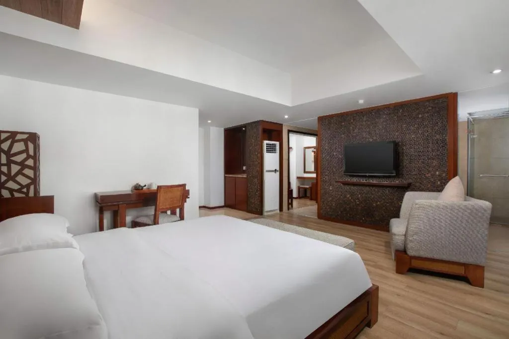 Bed in Ramada Encore by Wyndham Qionghai Downtown