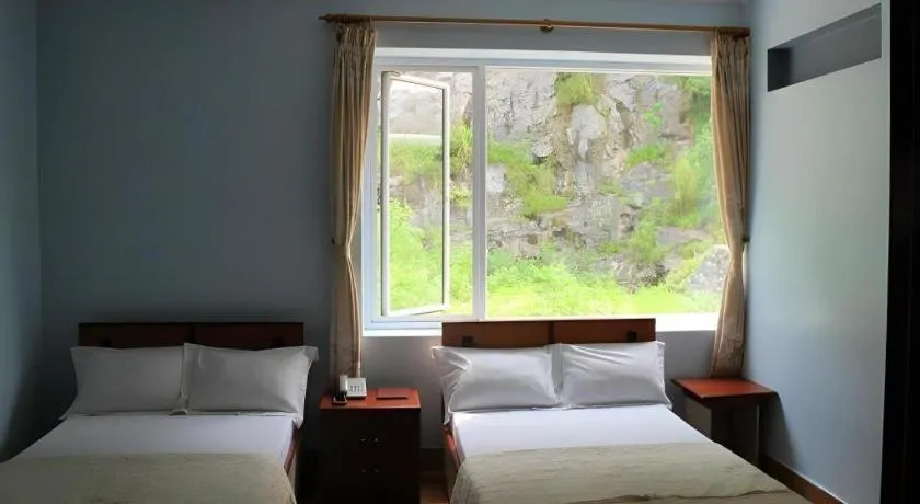 Bed in Ciao CatBa Hotel