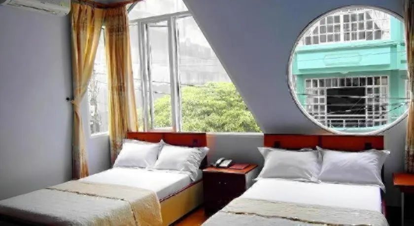 Bed in Ciao CatBa Hotel