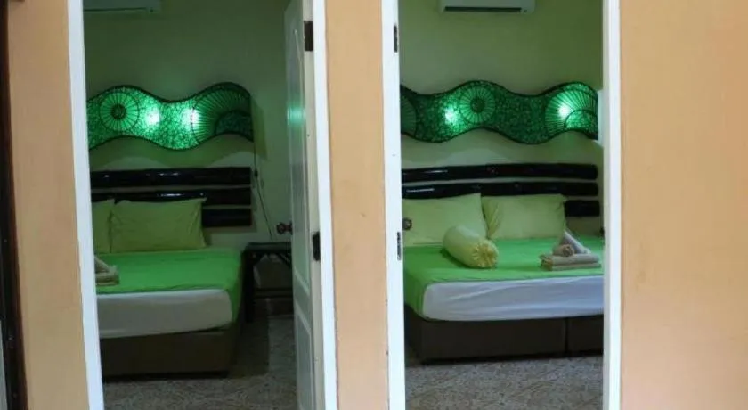 Bed in Kamala Tropical Garden Hotel