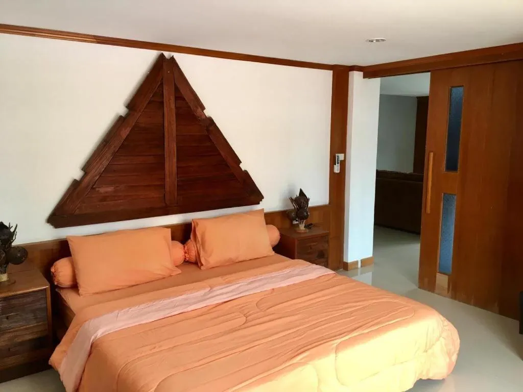 Bed in Kamala Tropical Garden Hotel