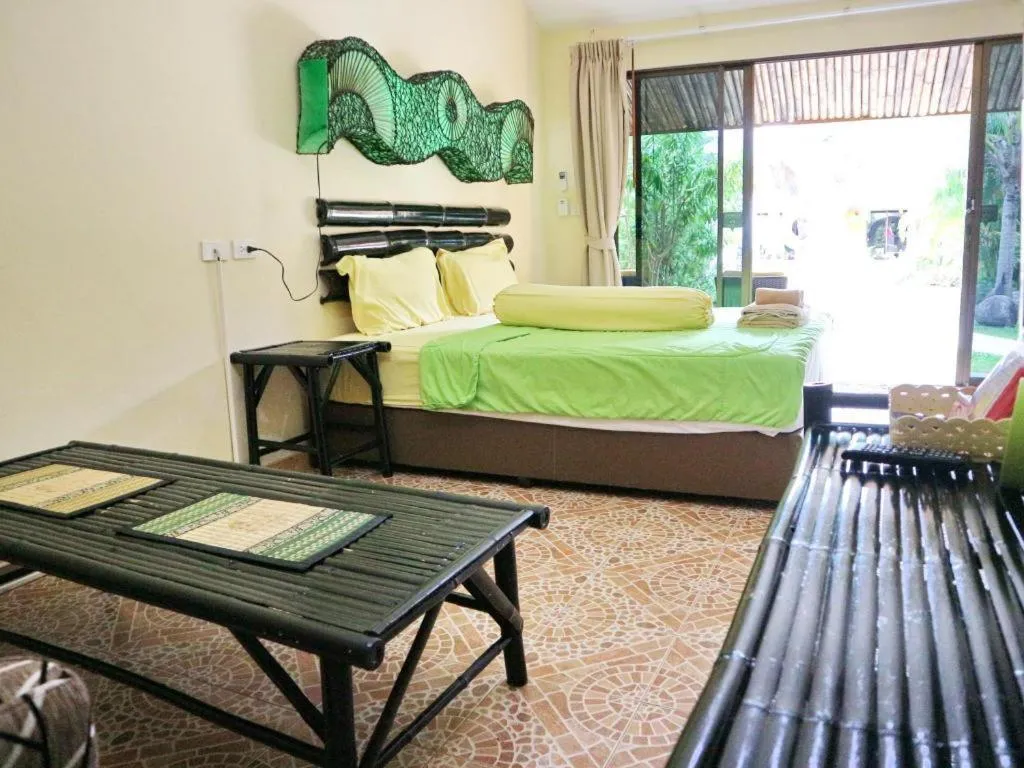 Bed in Kamala Tropical Garden Hotel