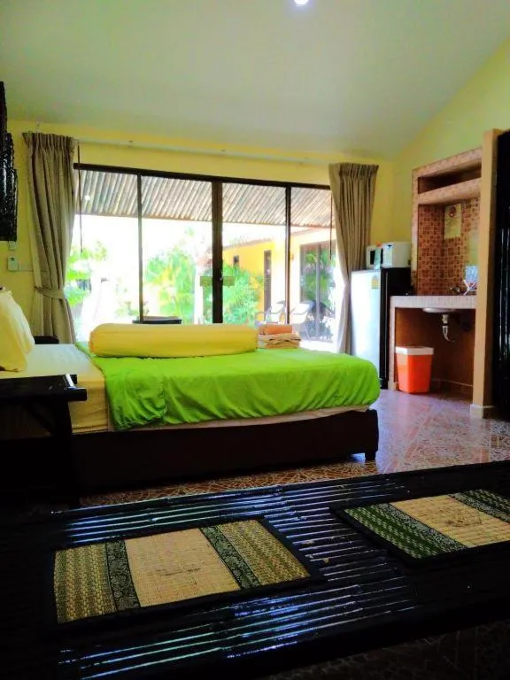 Bed in Kamala Tropical Garden Hotel