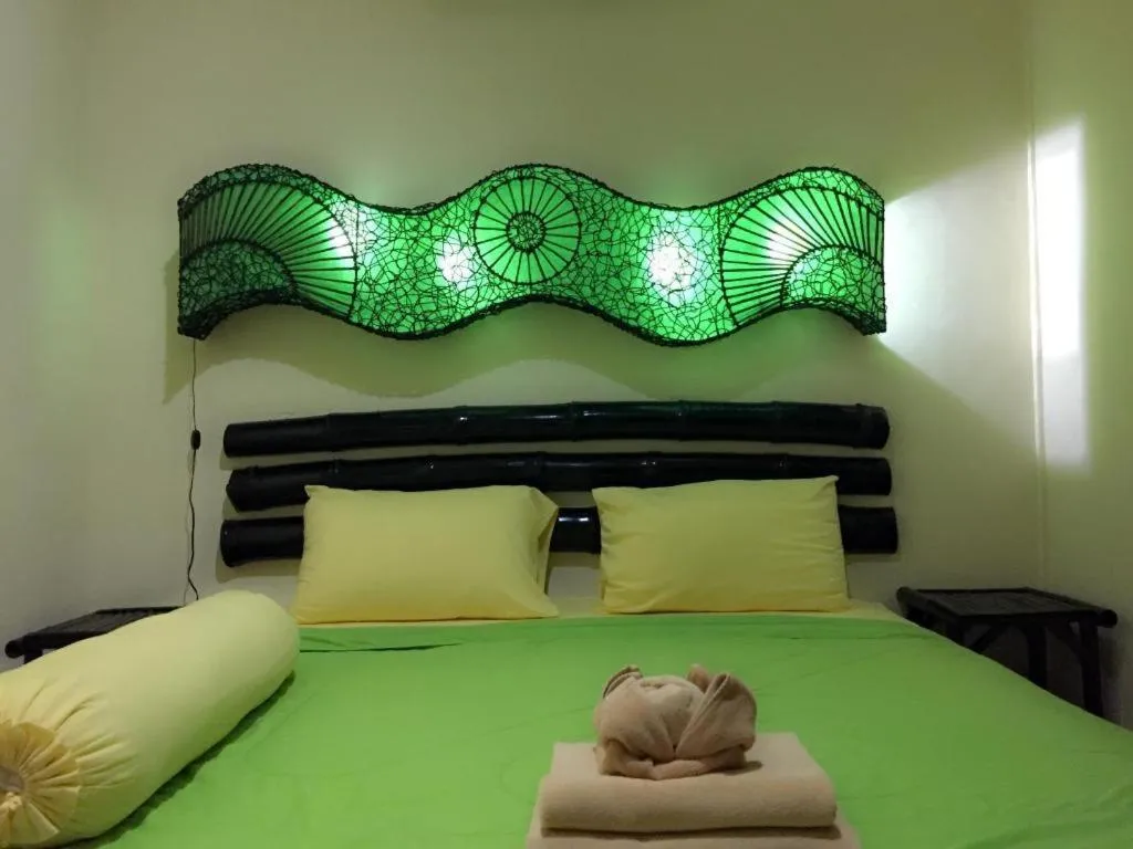 Bed in Kamala Tropical Garden Hotel