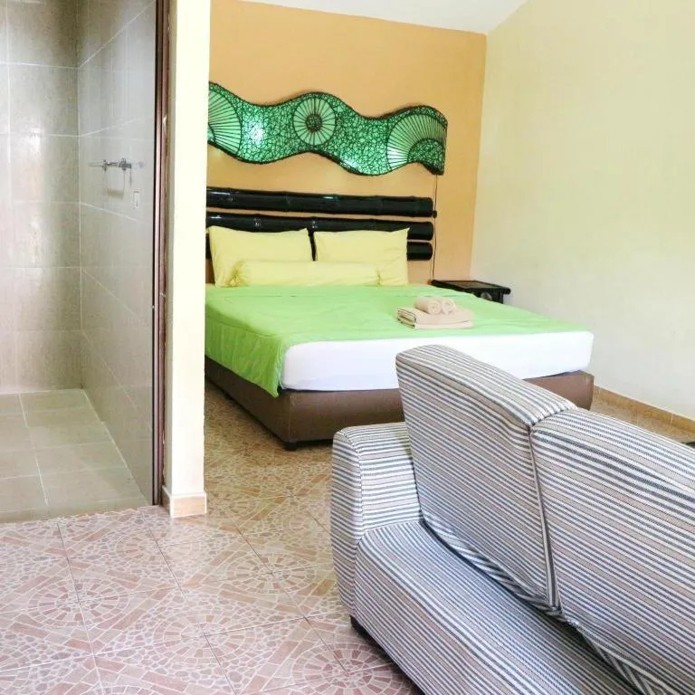 Bed in Kamala Tropical Garden Hotel