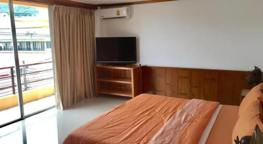 Bed in Kamala Tropical Garden Hotel