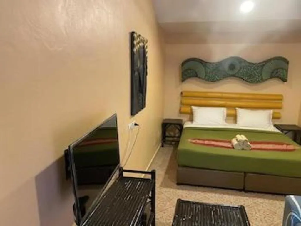 Bed in Kamala Tropical Garden Hotel