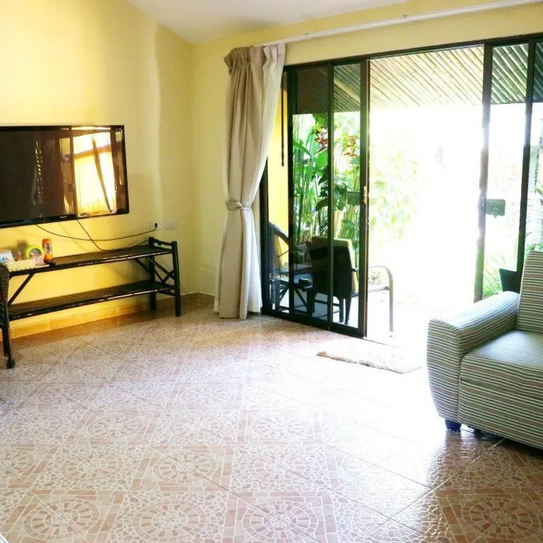 Bed in Kamala Tropical Garden Hotel