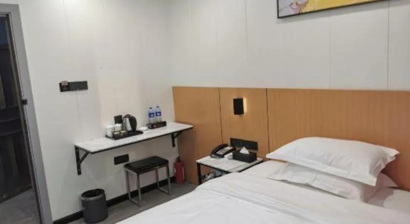 Bed in Xinghe Xinfeng Hotel Railway Station & Bus Station Branch