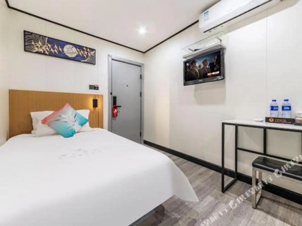 Bed in Xinghe Xinfeng Hotel Railway Station & Bus Station Branch