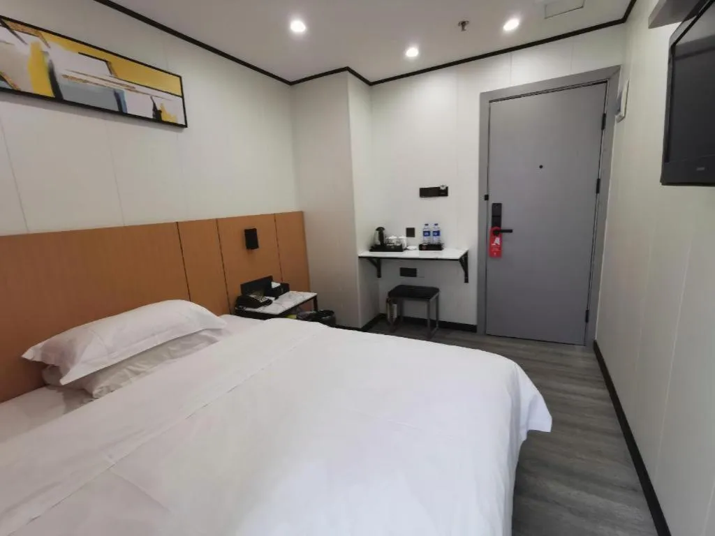 Bed in Xinghe Xinfeng Hotel Railway Station & Bus Station Branch