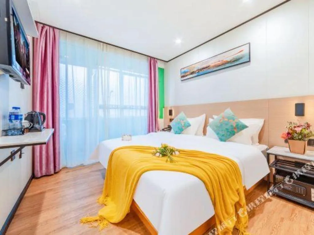 Bed in Xinghe Xinfeng Hotel Railway Station & Bus Station Branch