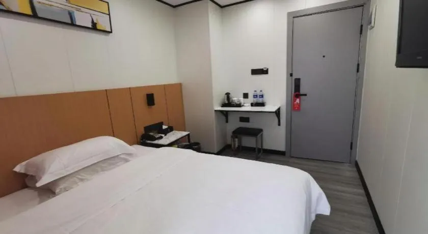 Bed in Xinghe Xinfeng Hotel Railway Station & Bus Station Branch