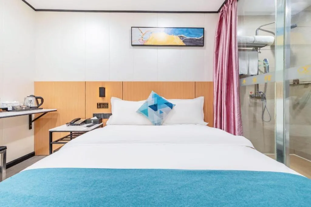 Bed in Xinghe Xinfeng Hotel Railway Station & Bus Station Branch