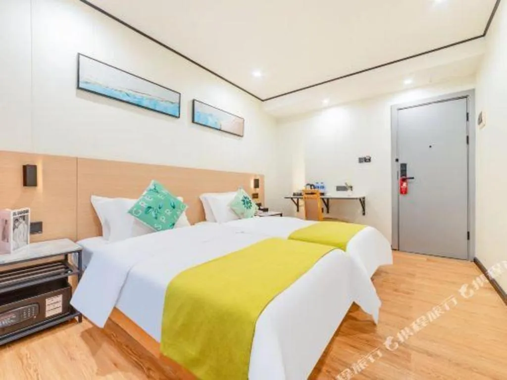 Bed in Xinghe Xinfeng Hotel Railway Station & Bus Station Branch