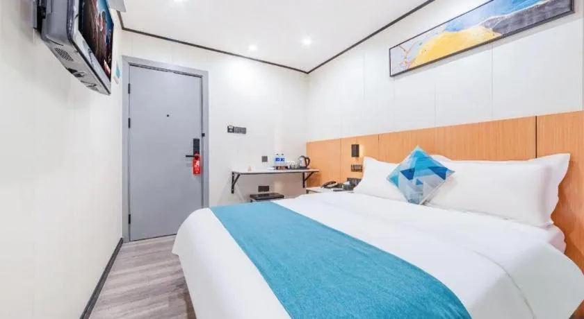 Bed in Xinghe Xinfeng Hotel Railway Station & Bus Station Branch