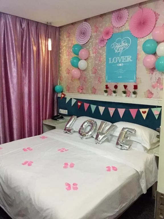 Bed in Xinghe Xinfeng Hotel Railway Station & Bus Station Branch