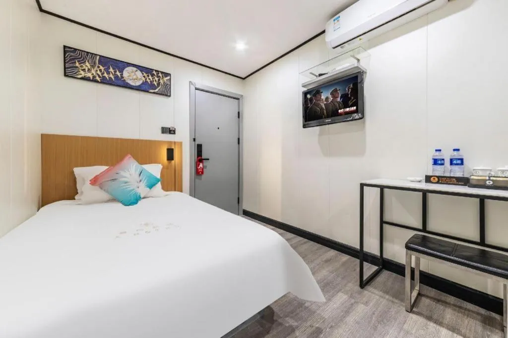 Bed in Xinghe Xinfeng Hotel Railway Station & Bus Station Branch