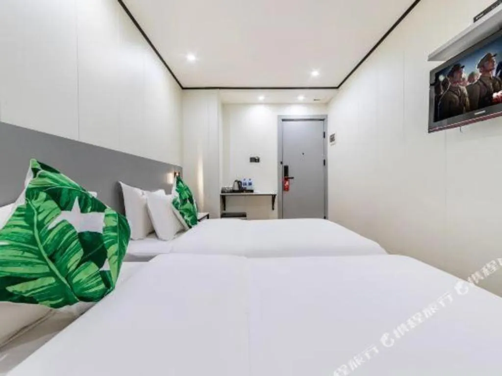 Bed in Xinghe Xinfeng Hotel Railway Station & Bus Station Branch