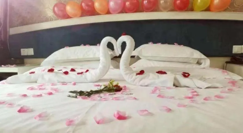 Bed in Xinghe Xinfeng Hotel Railway Station & Bus Station Branch