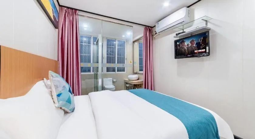 Bed in Xinghe Xinfeng Hotel Railway Station & Bus Station Branch