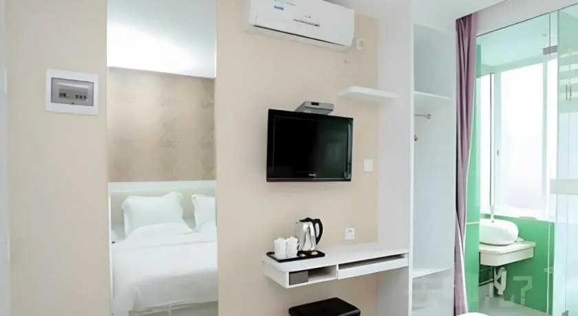 Bed in Xinghe Xinfeng Hotel Railway Station & Bus Station Branch