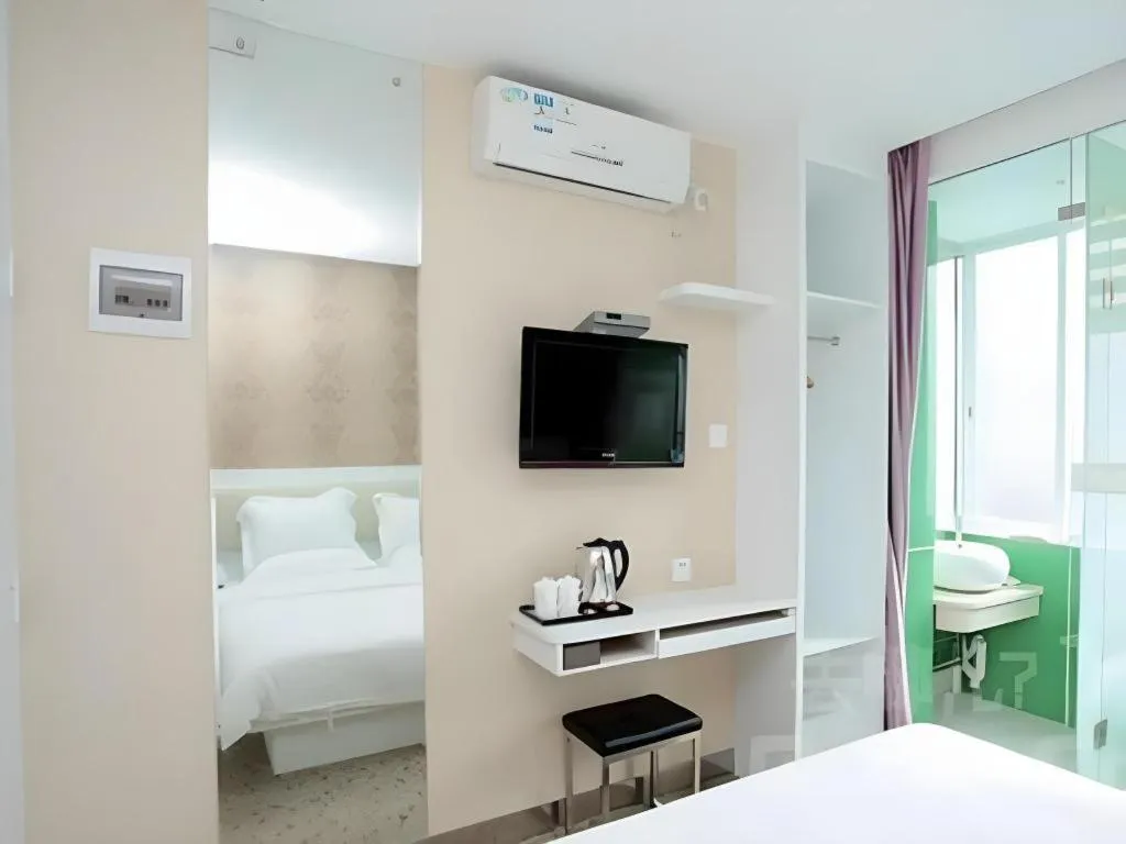 Bed in Xinghe Xinfeng Hotel Railway Station & Bus Station Branch