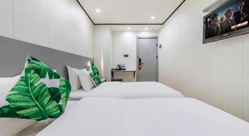 Bed in Xinghe Xinfeng Hotel Railway Station & Bus Station Branch