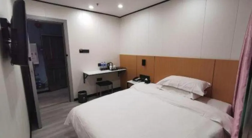 Bed in Xinghe Xinfeng Hotel Railway Station & Bus Station Branch