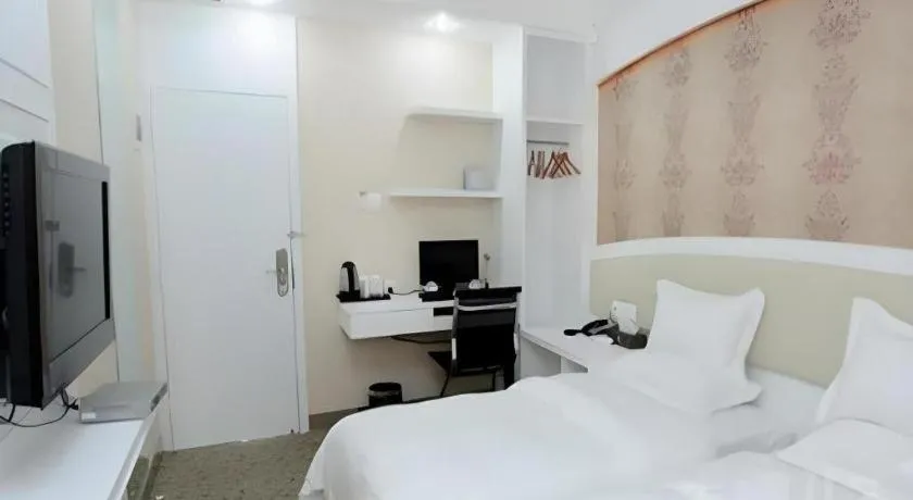 Bed in Xinghe Xinfeng Hotel Railway Station & Bus Station Branch