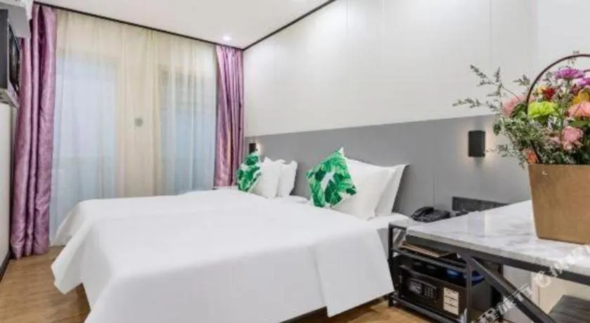 Bed in Xinghe Xinfeng Hotel Railway Station & Bus Station Branch