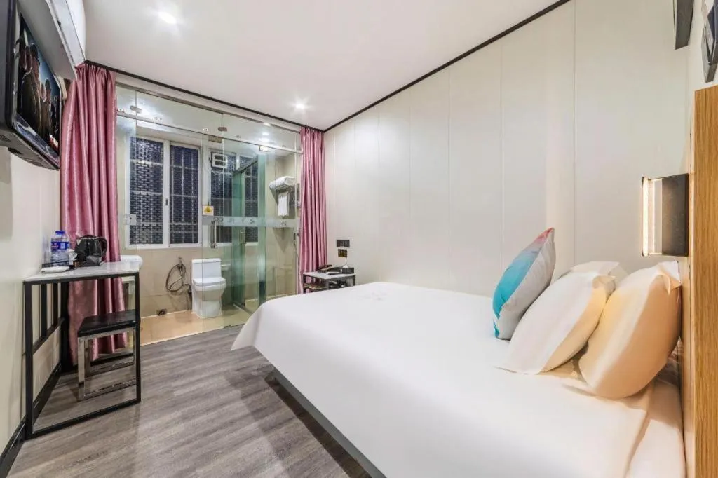 Bed in Xinghe Xinfeng Hotel Railway Station & Bus Station Branch