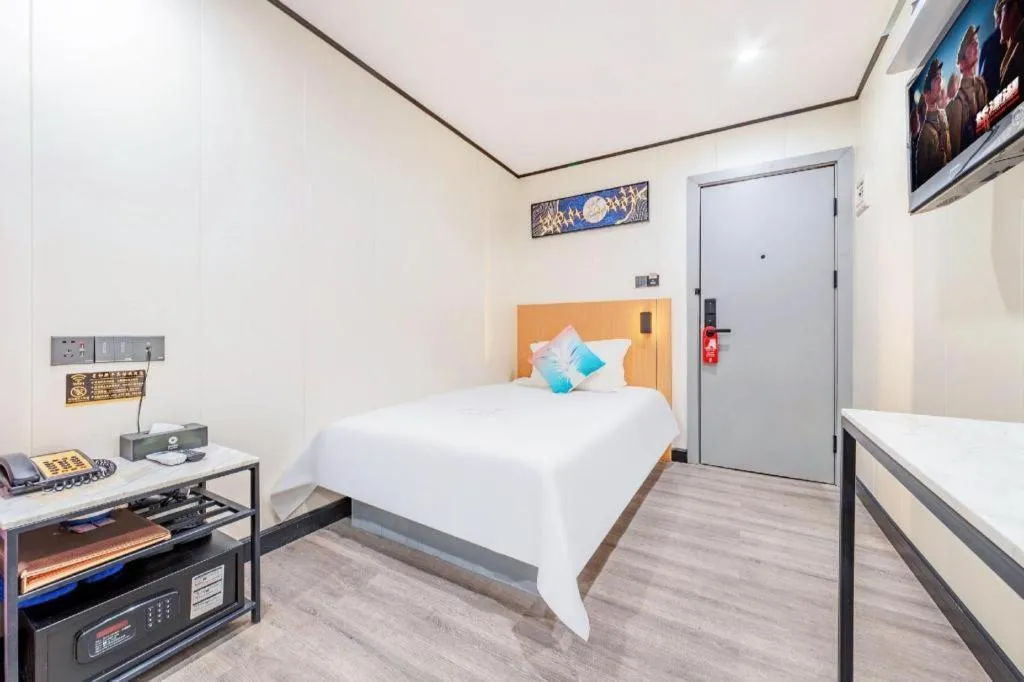 Bed in Xinghe Xinfeng Hotel Railway Station & Bus Station Branch