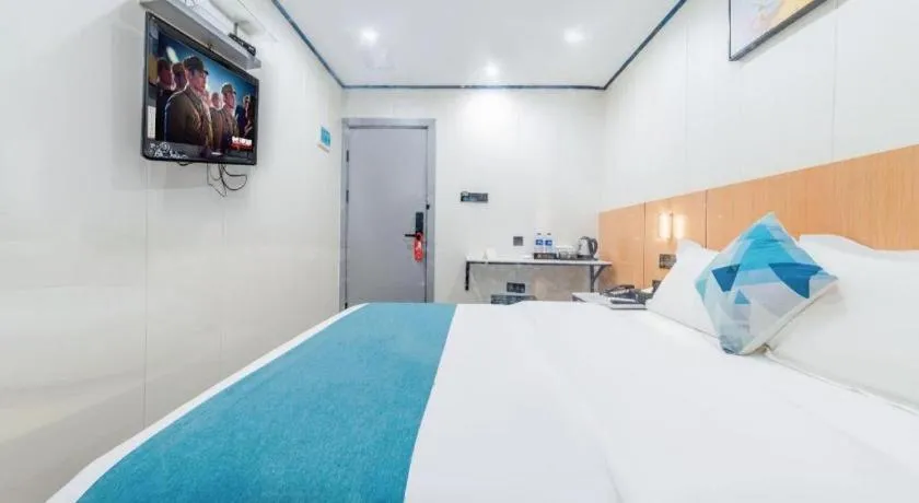 Bed in Xinghe Xinfeng Hotel Railway Station & Bus Station Branch