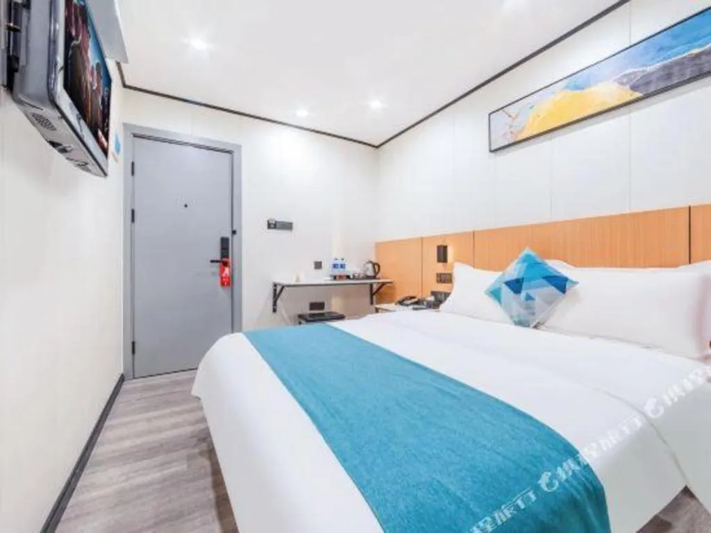 Bed in Xinghe Xinfeng Hotel Railway Station & Bus Station Branch