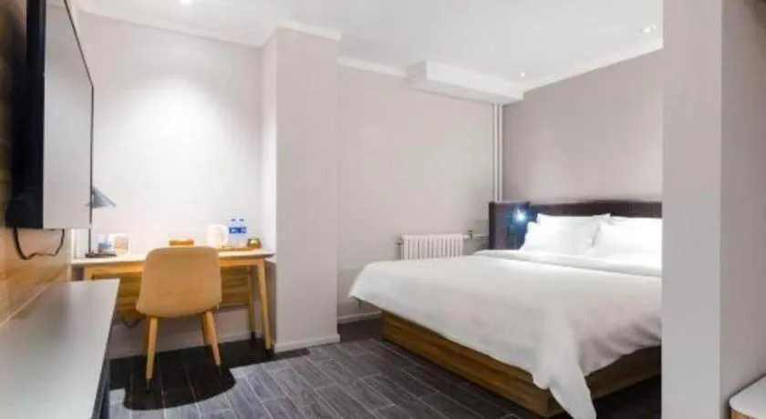 Bed in Hanting Premium Hotel Beijing Wudaokou East Gate of Tsinghua